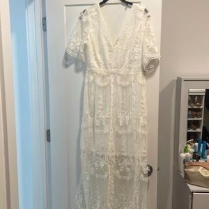 Gently used lace dress, with sleeves. Maxi, size L.